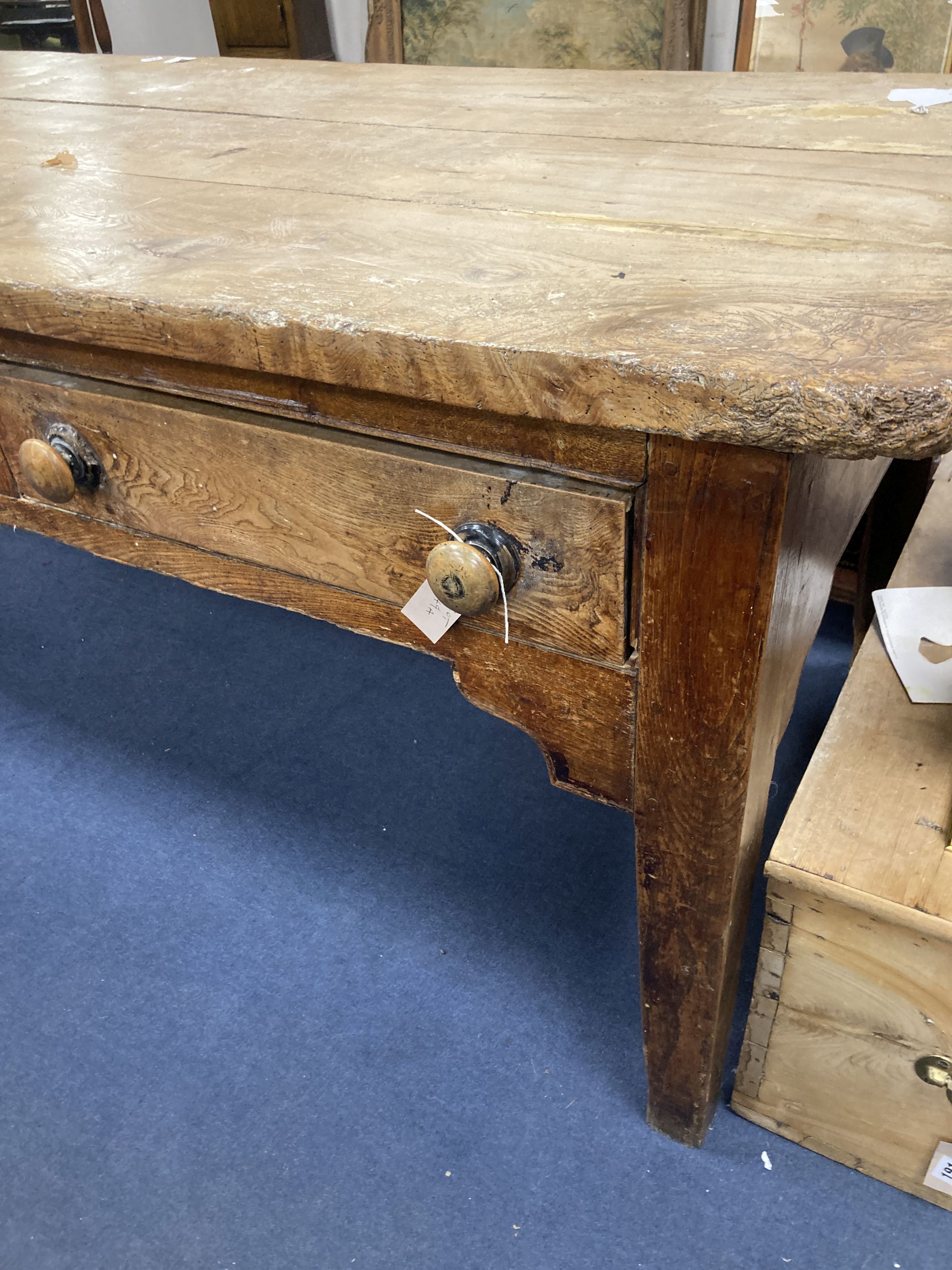 A large 19th century elm kitchen table fitted three drawers, length 227cm, width 88cm, height 80cm